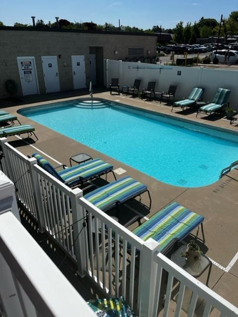 view of swimming pool featuring a patio