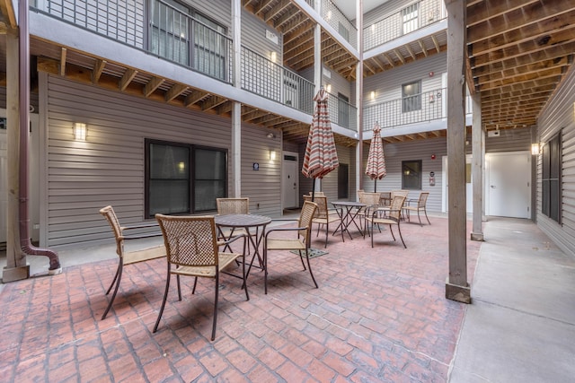 view of patio / terrace featuring a balcony