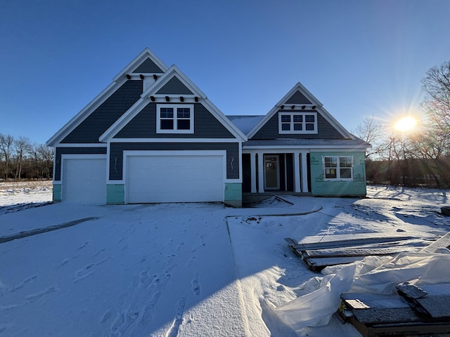 view of front of property with a garage