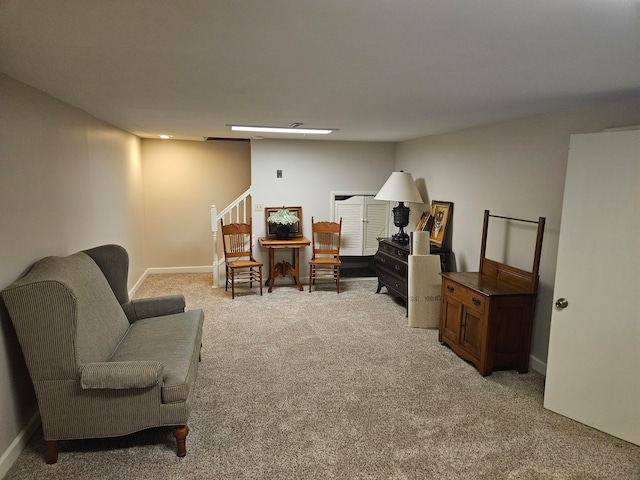 sitting room with light colored carpet