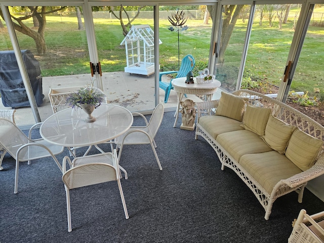 view of patio with area for grilling and an outdoor hangout area