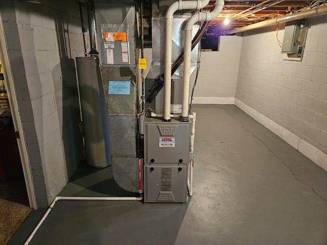 utility room featuring electric panel and heating unit