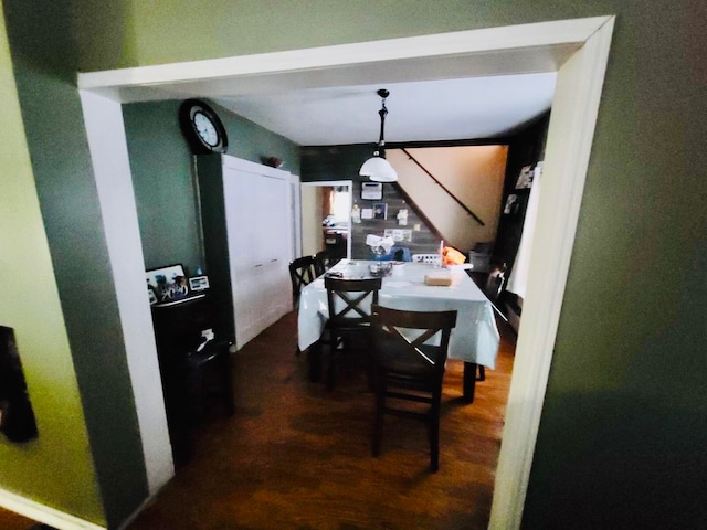 dining room featuring dark hardwood / wood-style flooring