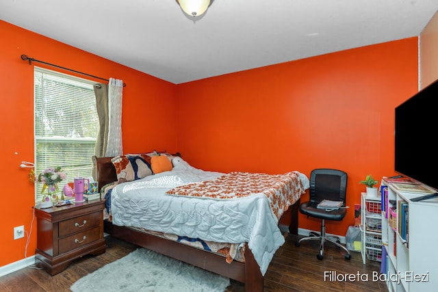 bedroom featuring dark hardwood / wood-style floors