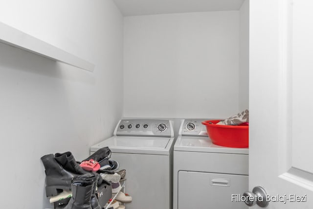 laundry room with washer and dryer