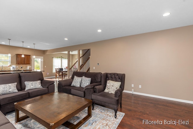 living room featuring dark hardwood / wood-style floors