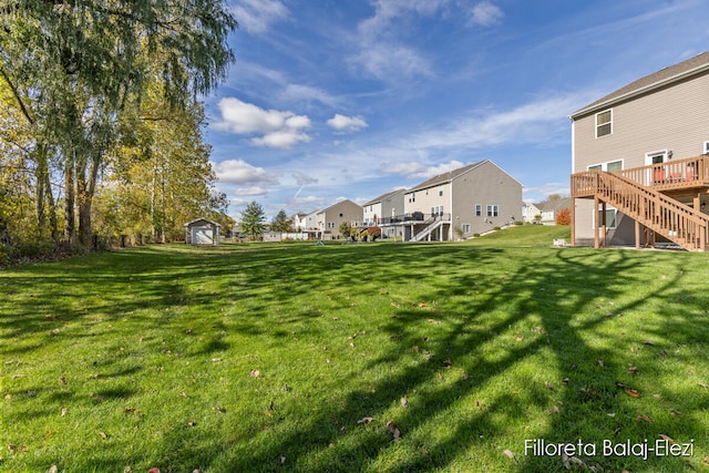 view of yard featuring a deck