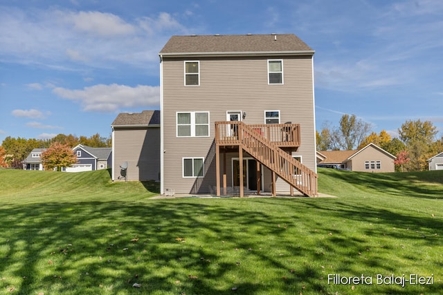 back of property featuring a deck and a yard