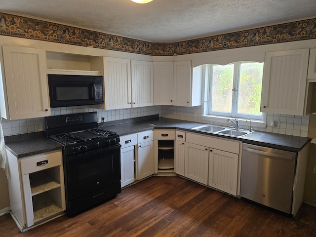 kitchen featuring dark wood-type flooring, sink, black appliances, white cabinets, and tasteful backsplash