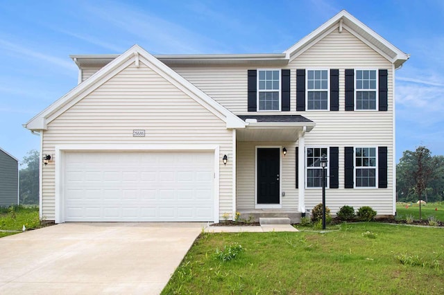 view of front facade with a front lawn and a garage