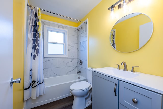 full bathroom featuring toilet, shower / bath combo with shower curtain, vanity, and wood-type flooring