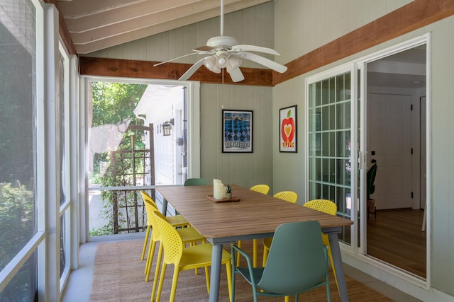 sunroom / solarium featuring vaulted ceiling and ceiling fan