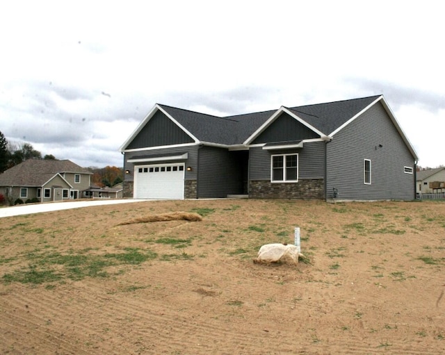 craftsman-style home with a garage