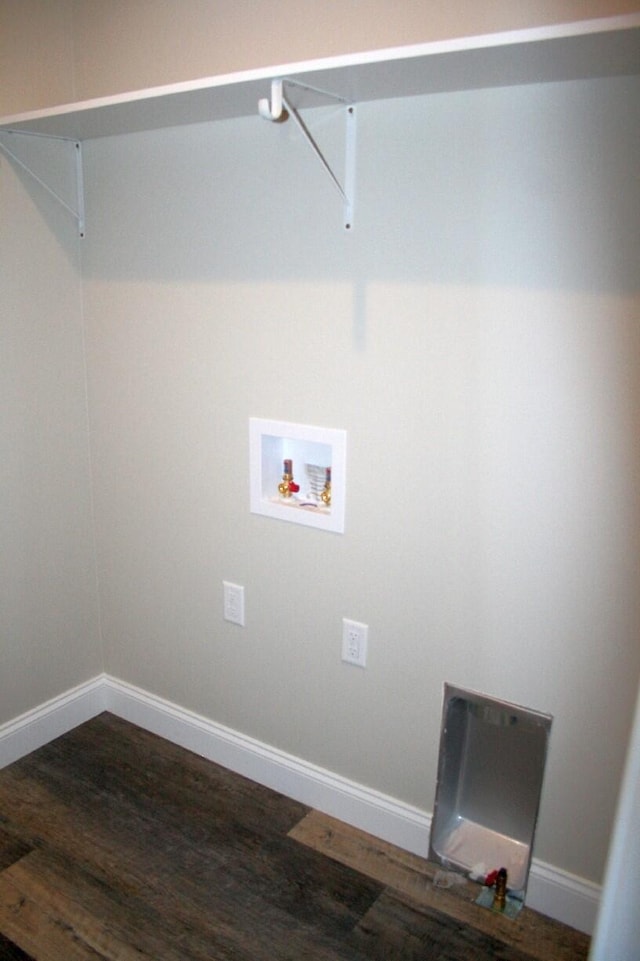 clothes washing area featuring hookup for a washing machine and hardwood / wood-style flooring