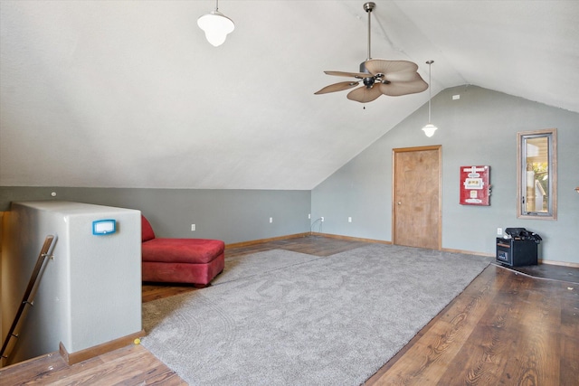 bonus room featuring ceiling fan, lofted ceiling, and hardwood / wood-style floors