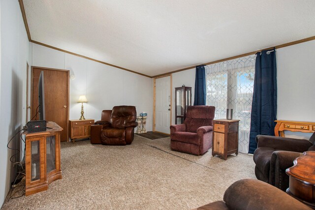 living room featuring vaulted ceiling, a textured ceiling, carpet floors, and ornamental molding