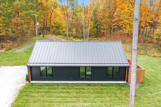 exterior space featuring a front lawn