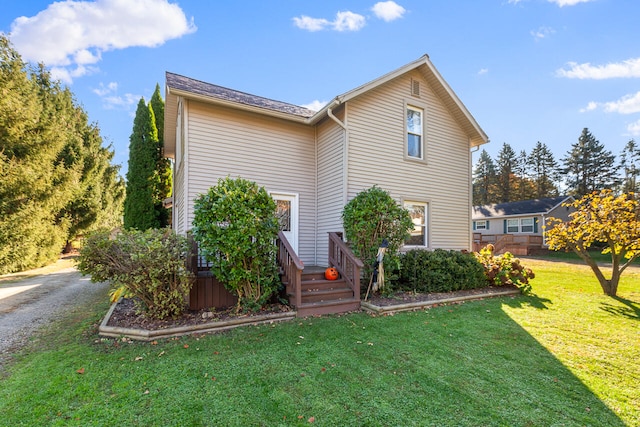 exterior space featuring a front lawn