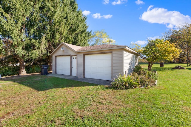 garage with a yard