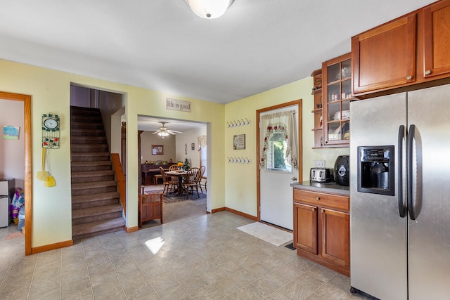 kitchen with ceiling fan and stainless steel fridge