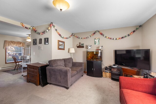 living room with a baseboard radiator, ceiling fan, and carpet floors