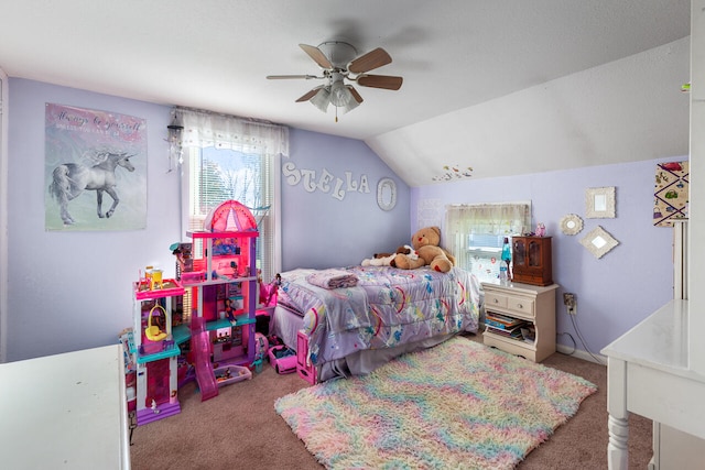 carpeted bedroom featuring lofted ceiling and ceiling fan