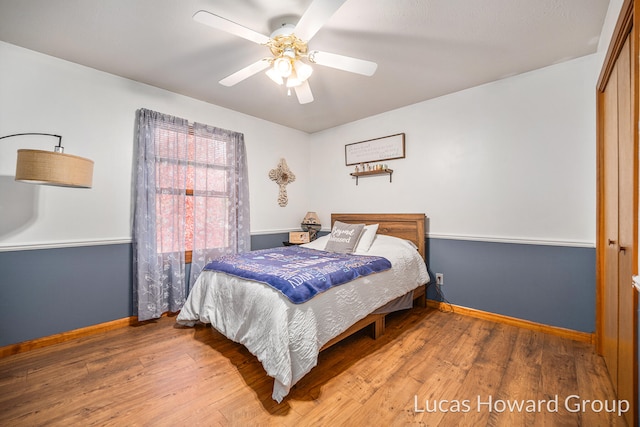 bedroom featuring a closet, ceiling fan, and hardwood / wood-style floors