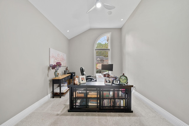 office featuring vaulted ceiling and light carpet