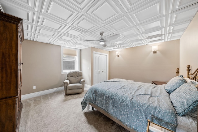 carpeted bedroom with a closet