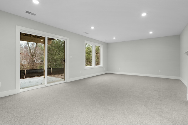 unfurnished living room with carpet flooring