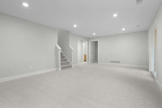 interior space featuring light colored carpet