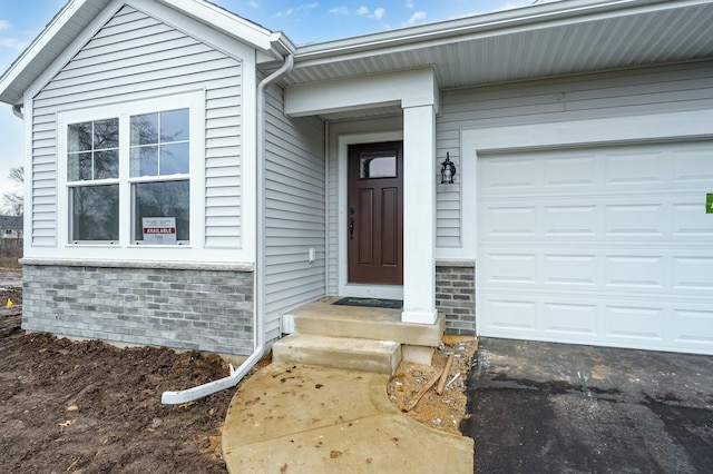 entrance to property with a garage