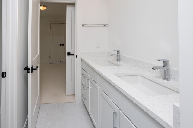 bathroom featuring vanity and tile patterned floors