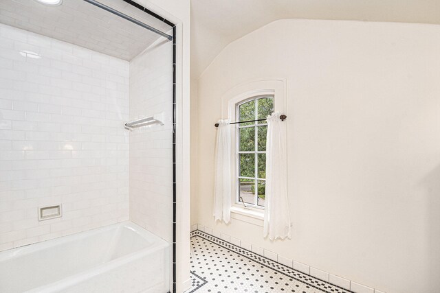 bathroom with lofted ceiling