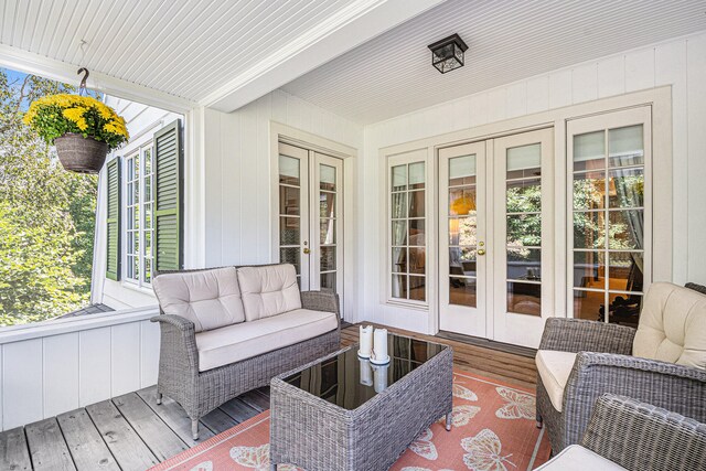 wooden deck featuring french doors