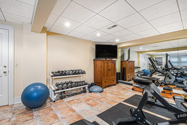 workout area with tile patterned flooring