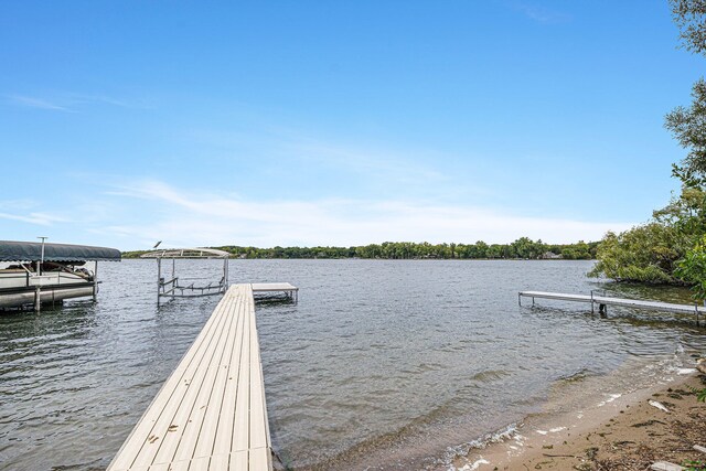 dock area with a water view