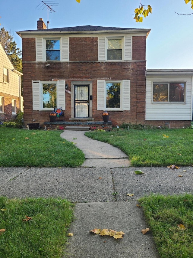 view of front of property with a front yard