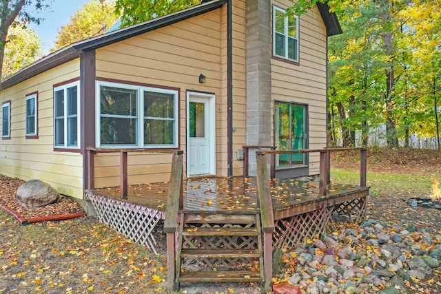 exterior space featuring a wooden deck