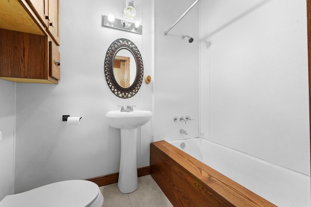 full bathroom with sink, toilet, tile patterned floors, and shower / tub combination