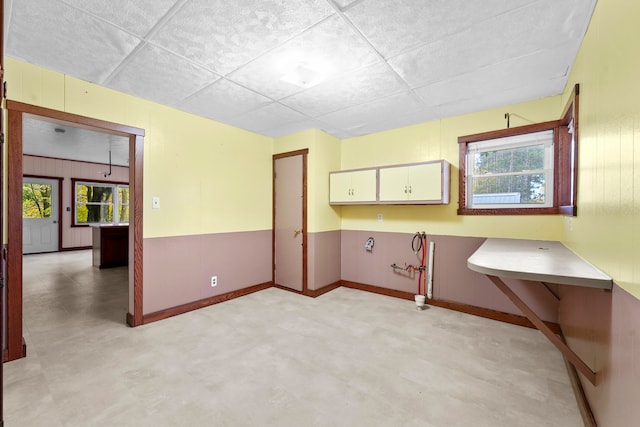 interior space featuring a paneled ceiling