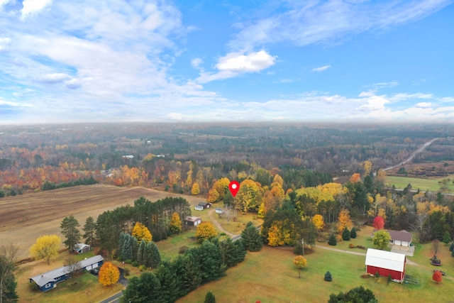 birds eye view of property featuring a rural view