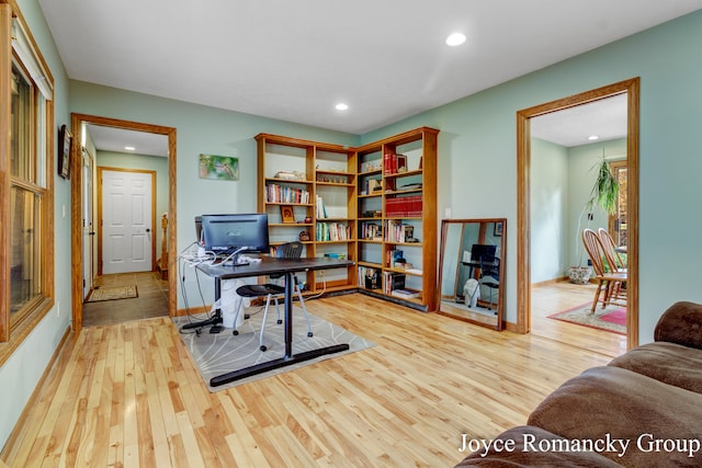 office area with wood-type flooring