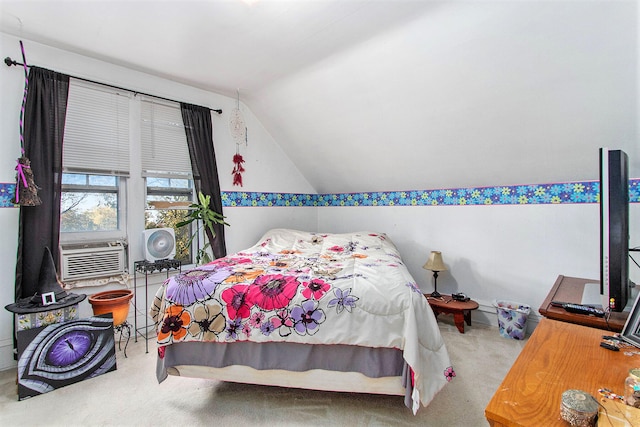 bedroom featuring cooling unit, lofted ceiling, and carpet floors