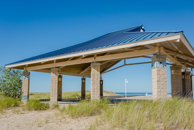 surrounding community featuring a water view