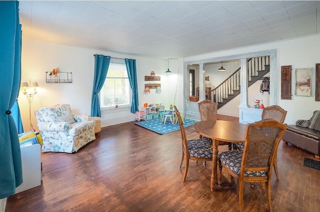 dining room featuring dark wood-type flooring