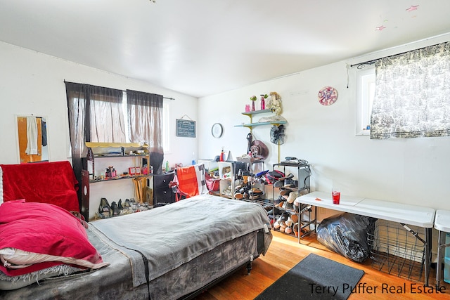 bedroom featuring hardwood / wood-style floors