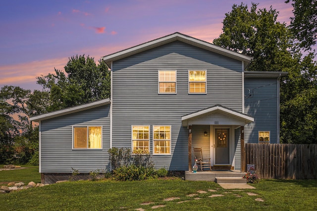 view of front of house featuring a yard