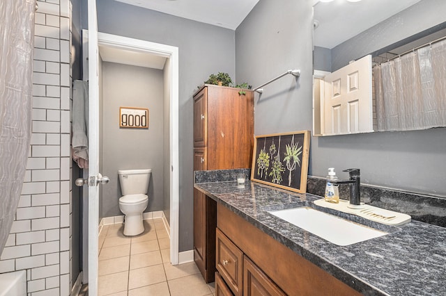 bathroom with vanity, toilet, tile patterned floors, and a shower with shower curtain