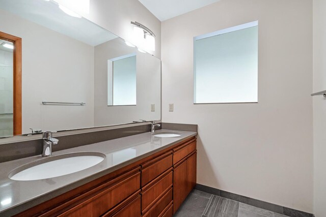 bathroom featuring tile patterned floors and vanity